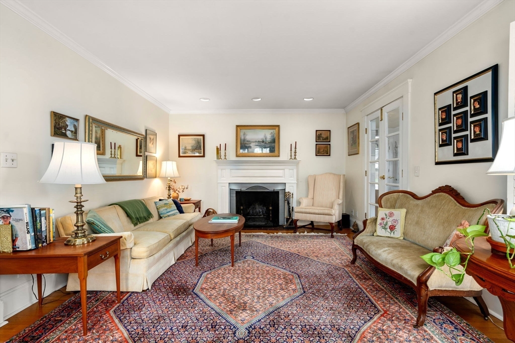 347 Manning Street Needham, MA 02492 - Photo 4 of 42 a living room with furniture and a fireplace