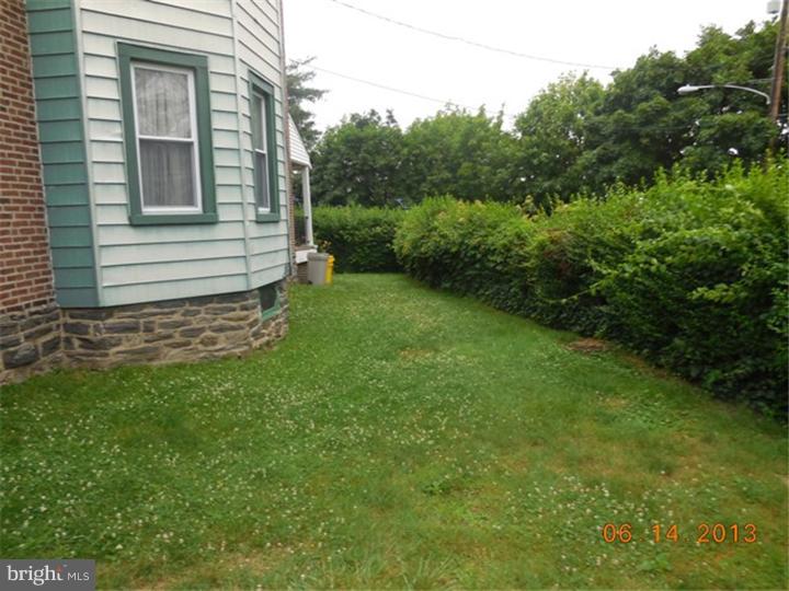 14 West Park Road Havertown, PA 19083 - Photo 13 of 15 a view of a backyard with plants and large trees