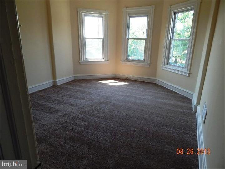14 West Park Road Havertown, PA 19083 - Photo 5 of 15 an empty room that has a window in it
