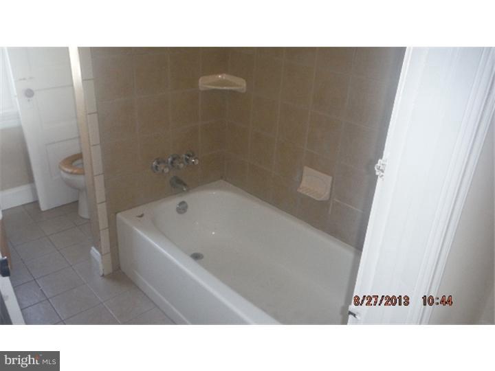 14 West Park Road Havertown, PA 19083 - Photo 10 of 15 a picture of a bathroom with a bathtub