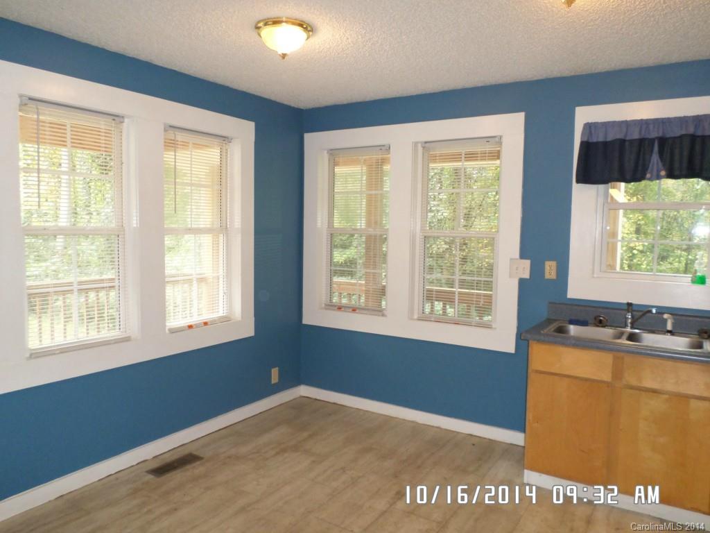 549 Pitt Street Morganton, NC 28655 - Photo 3 of 17 a view of an empty room with a window