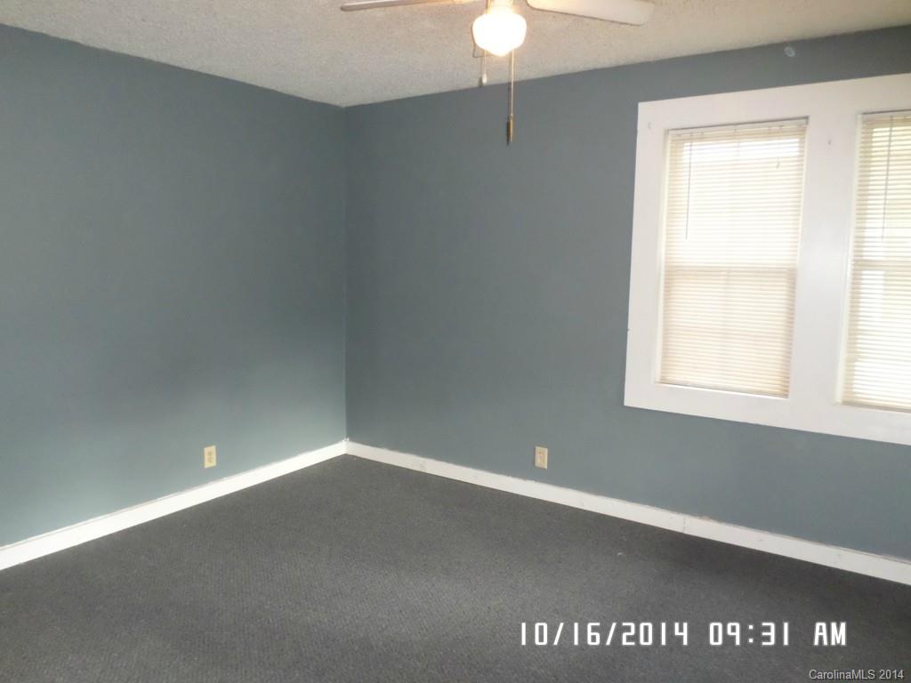 549 Pitt Street Morganton, NC 28655 - Photo 5 of 17 an empty room with a window