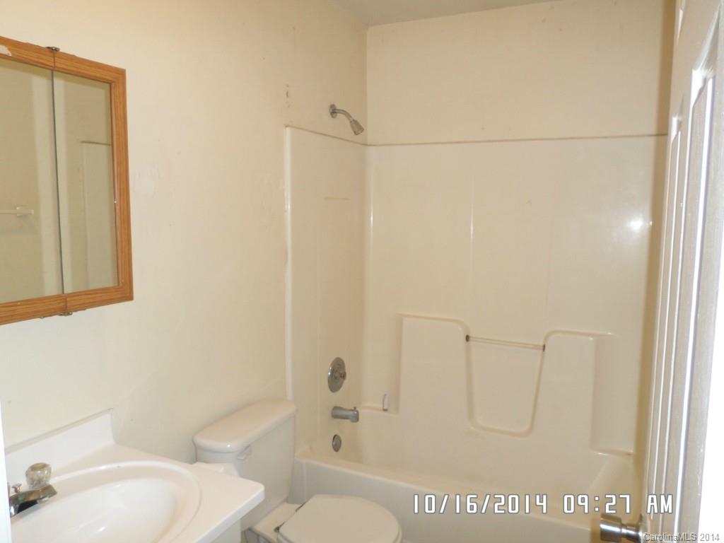 549 Pitt Street Morganton, NC 28655 - Photo 7 of 17 a bathroom with a shower and a toilet