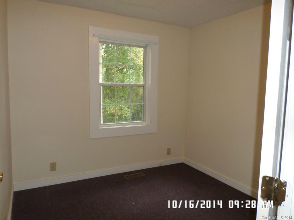 549 Pitt Street Morganton, NC 28655 - Photo 8 of 17 an empty room with a window