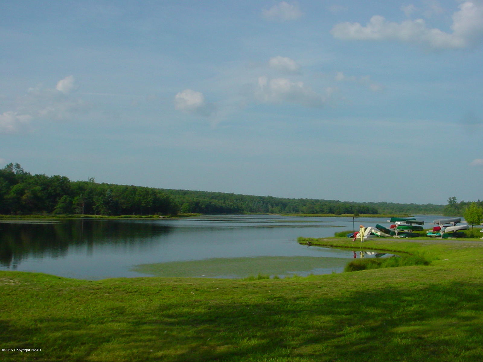 164 Buckhill Road Albrightsville, PA 18210 - Photo 17 of 21 a view of a lake with houses in the background