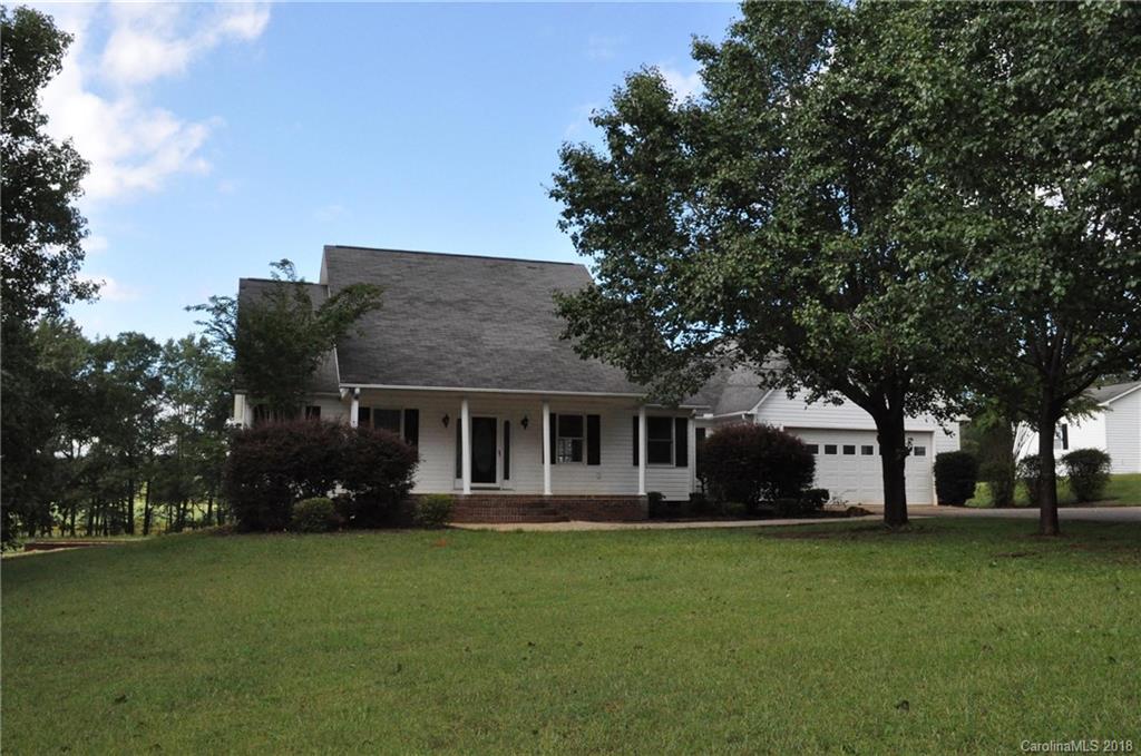 1200 Macedonia Church Road Campobello, SC 29322 - Photo 2 of 26 a front view of house with yard and green space