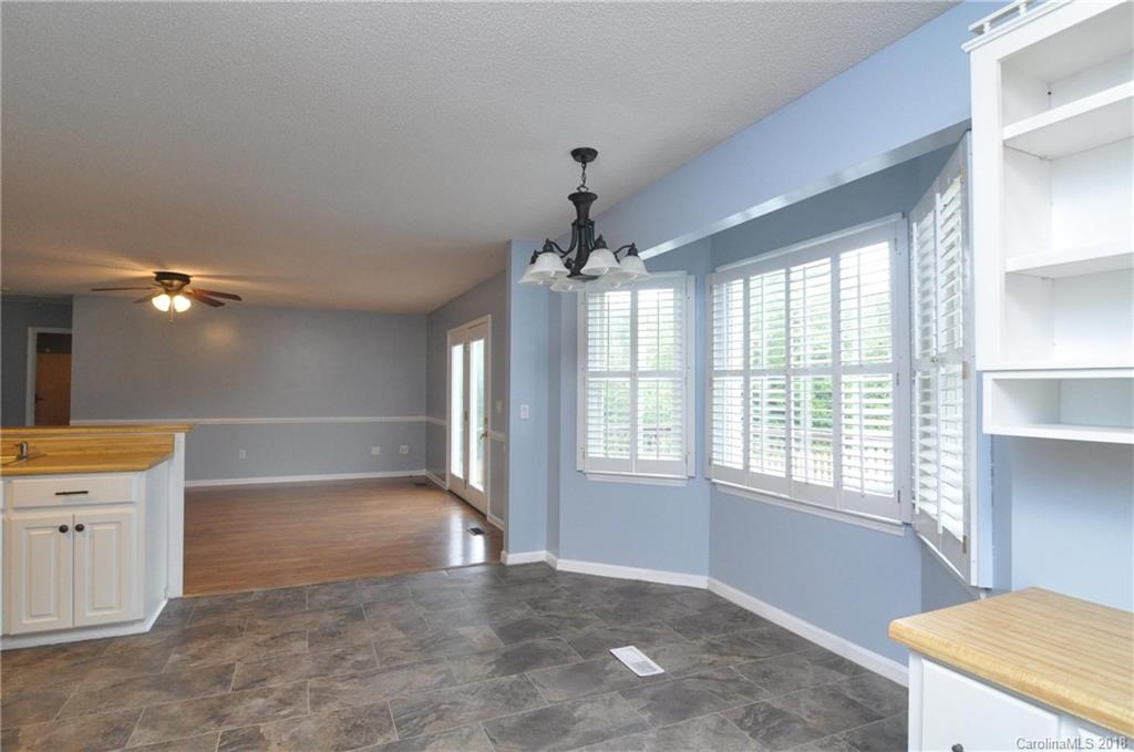 1200 Macedonia Church Road Campobello, SC 29322 - Photo 12 of 26 a view of livingroom with hardwood floor and a ceiling fan