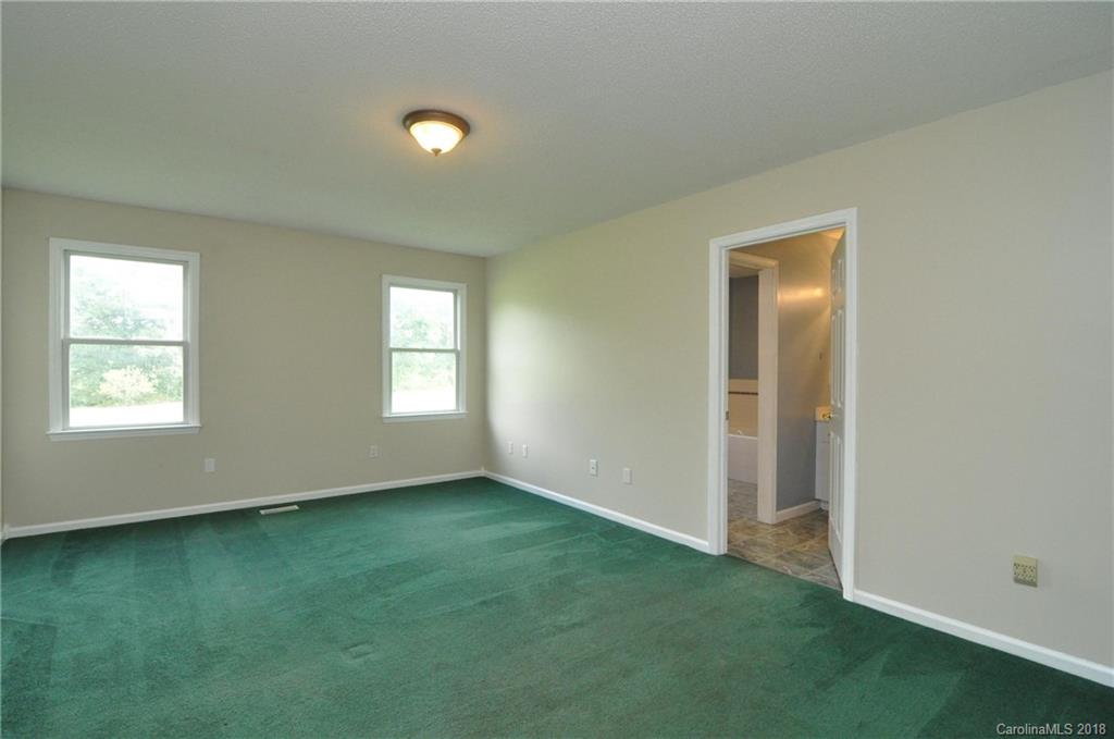1200 Macedonia Church Road Campobello, SC 29322 - Photo 17 of 26 a view of an empty room with window and closet