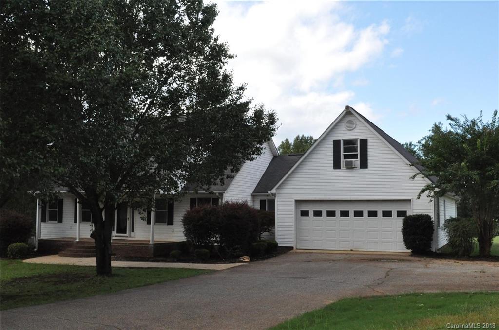 1200 Macedonia Church Road Campobello, SC 29322 - Photo 3 of 26 a view of a house with a yard and large tree