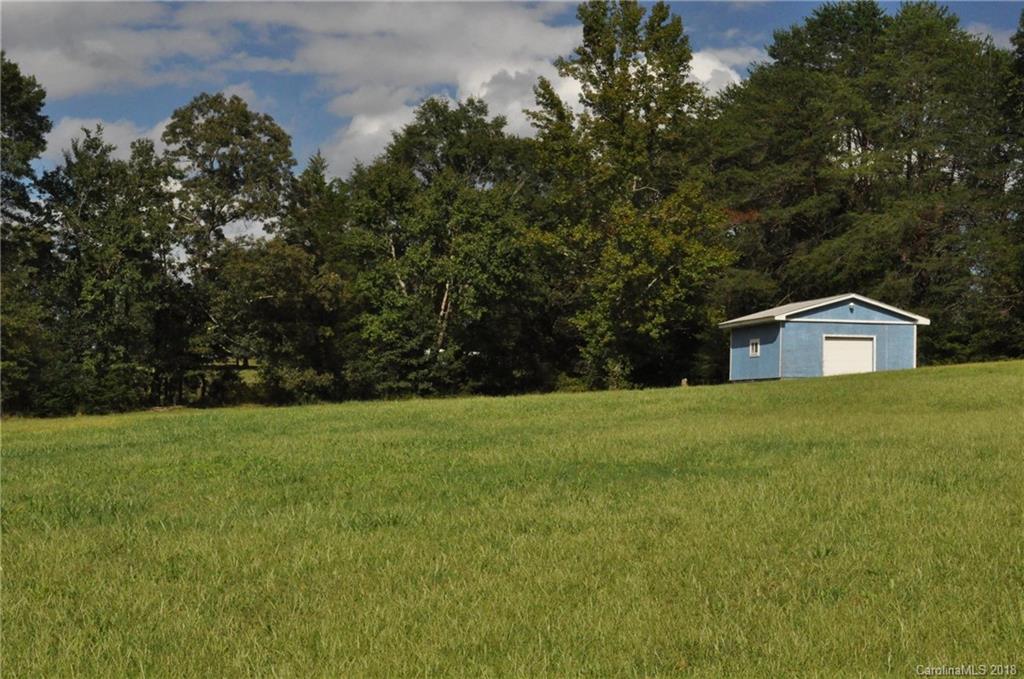 1200 Macedonia Church Road Campobello, SC 29322 - Photo 24 of 26 a front view of a house with a yard