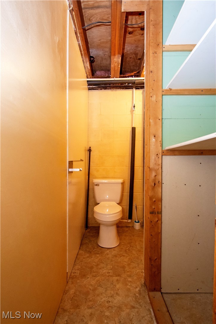12950 Shank Road Doylestown, OH 44230 - Photo 22 of 27 Bathroom with toilet, plumbed for a full bath