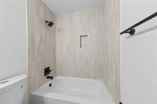 a bathroom with a bathtub
