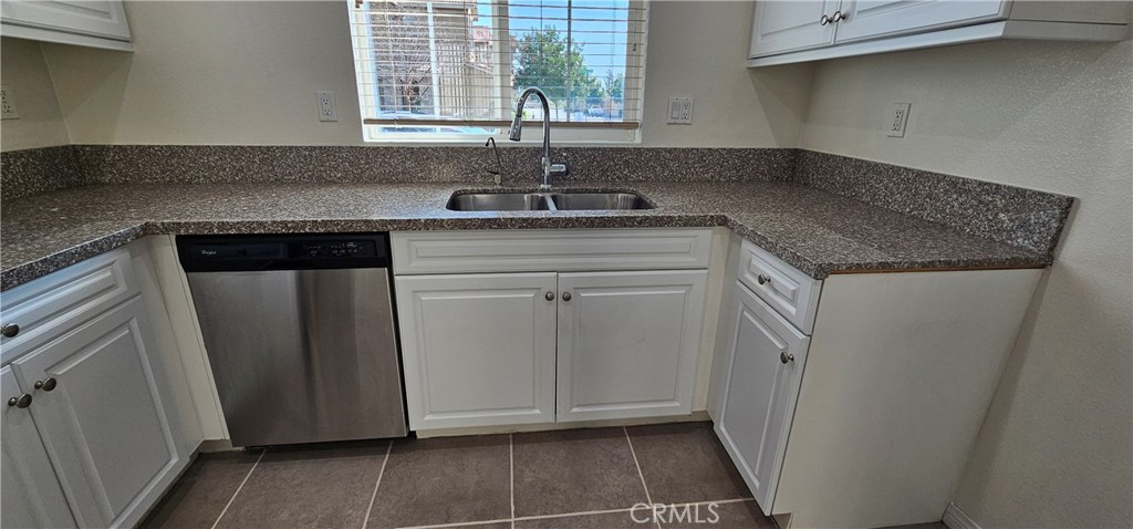 8652 Cava Drive Rancho Cucamonga, CA 91730 - Photo 13 of 44 a kitchen with a sink and cabinets