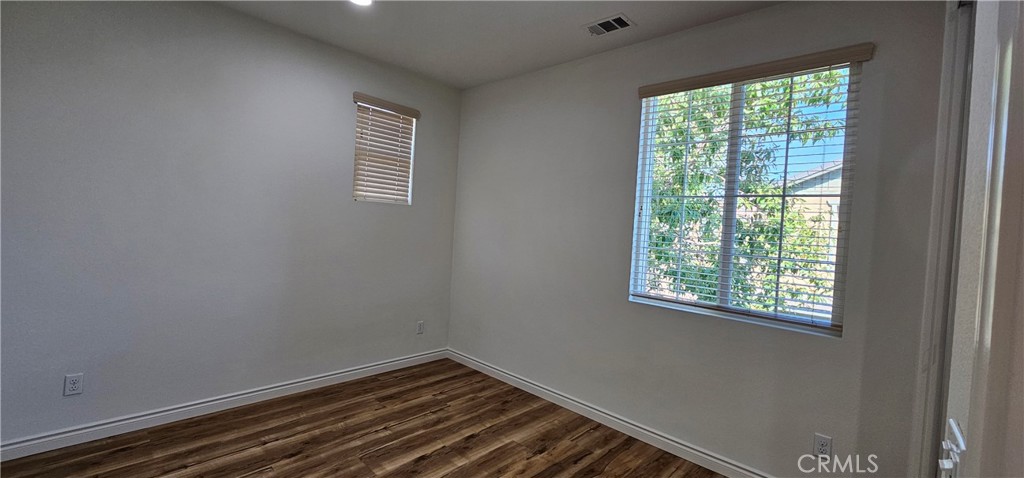 8652 Cava Drive Rancho Cucamonga, CA 91730 - Photo 32 of 44 a view of a room with wooden floor