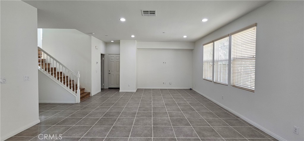 8652 Cava Drive Rancho Cucamonga, CA 91730 - Photo 7 of 44 an entryway in a hall with a window