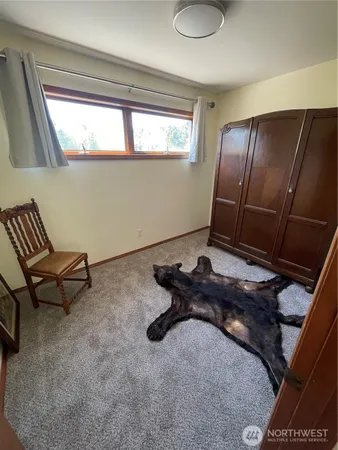 a room with furniture and window