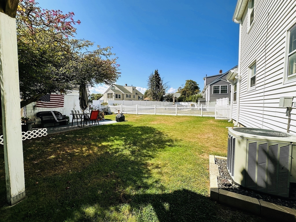 4 Mersea Street Saugus, MA 01906 - Photo 7 of 28 a view of a swimming pool with an outdoor space and seating area