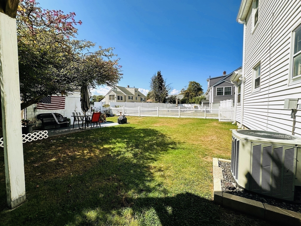 4 Mersea Street Saugus, MA 01906 - Photo 9 of 28 a view of a swimming pool with an outdoor space and seating area