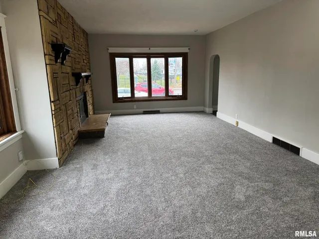 an empty room with windows