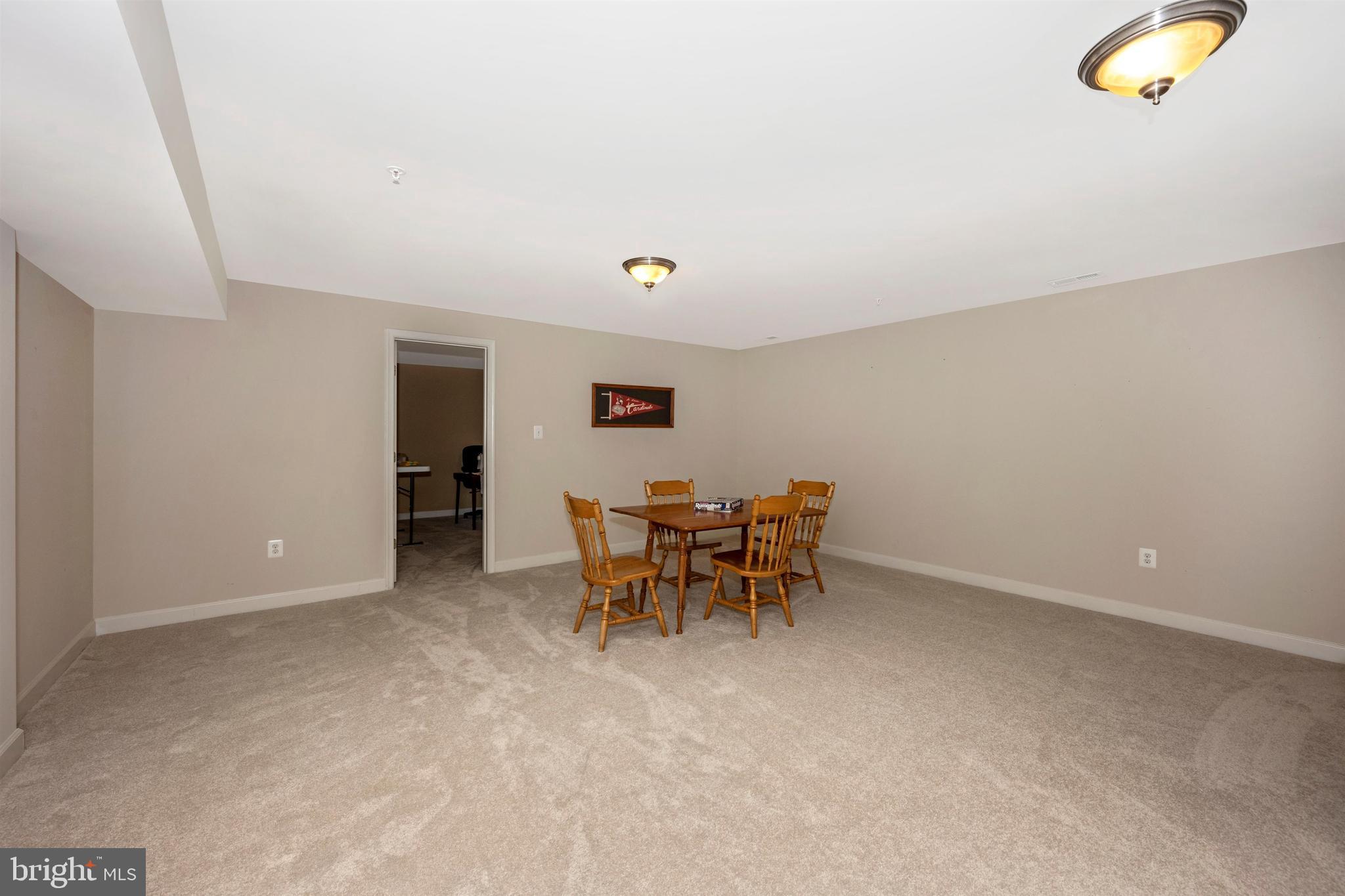 5813 Elmer Derr Road Frederick, MD 21703 - Photo 25 of 38 Lower level great room