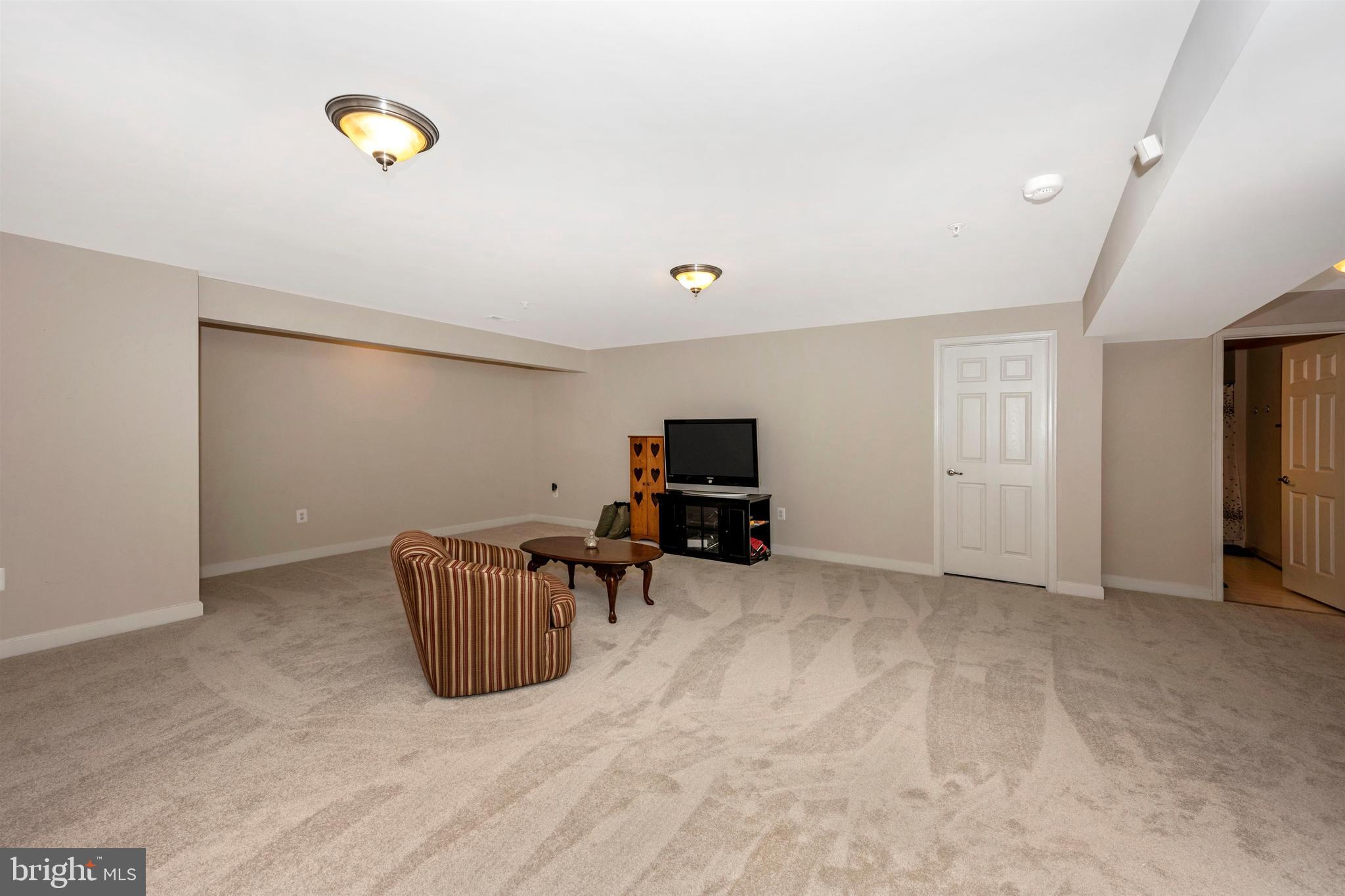 5813 Elmer Derr Road Frederick, MD 21703 - Photo 26 of 38 Lower level great room