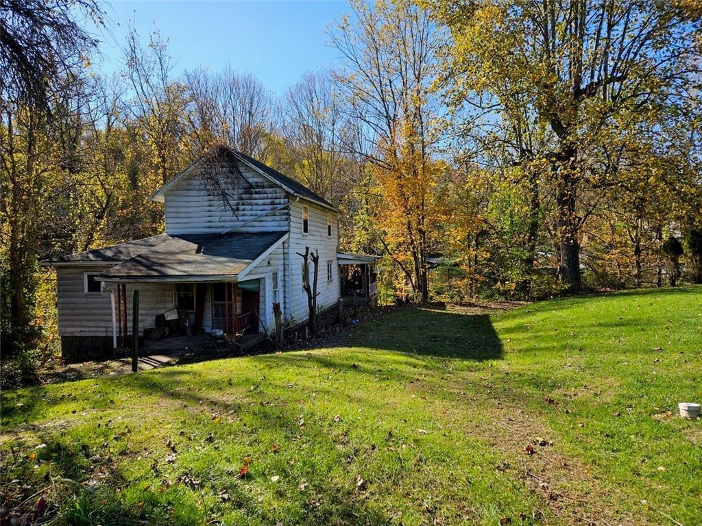 354 Wickhaven Road Wickhaven, PA 15492 - Photo 17 of 19 a view of a house with a yard