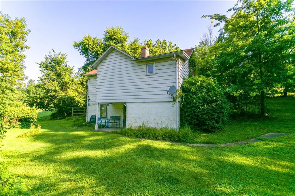 354 Wickhaven Road Wickhaven, PA 15492 - Photo 2 of 19 a house with a garden