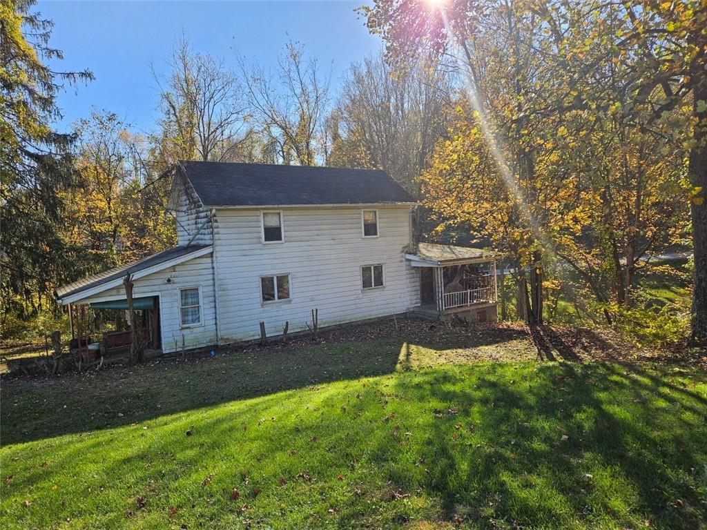 354 Wickhaven Road Wickhaven, PA 15492 - Photo 5 of 19 a view of a house with a yard