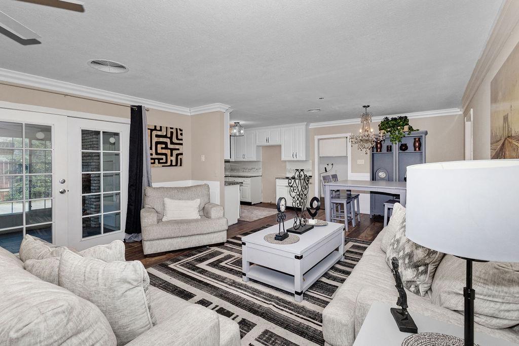 1124 Lakewood Avenue Modesto, CA 95355 - Photo 11 of 40 a living room with furniture and a table