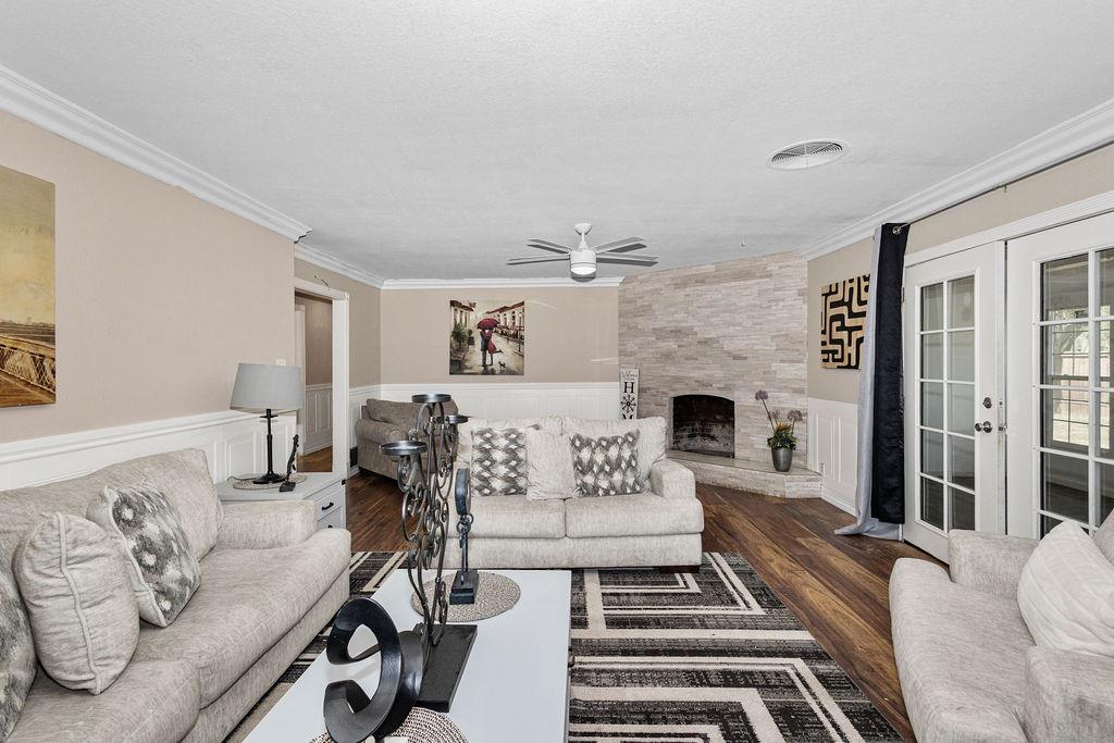 1124 Lakewood Avenue Modesto, CA 95355 - Photo 12 of 40 a living room with furniture and a fireplace