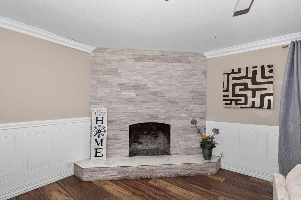 1124 Lakewood Avenue Modesto, CA 95355 - Photo 13 of 40 a living room with furniture and a fireplace