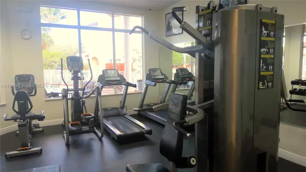 a view of a lake with a sitting area