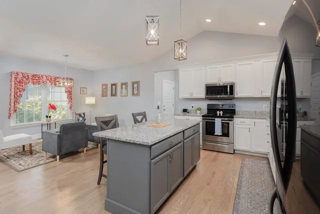 a kitchen with a sink and a window