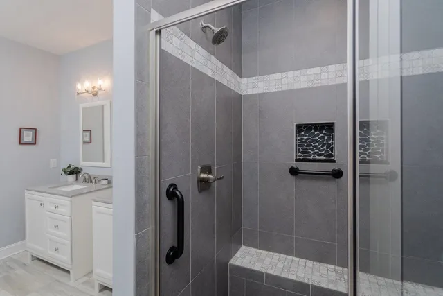 a bathroom with a sink and a mirror