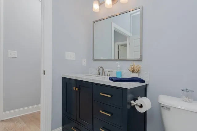 a work room with furniture and windows