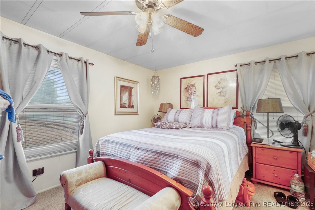 156 Connell Road Carthage, NC 28327 - Photo 13 of 43 a bedroom with a bed and a window