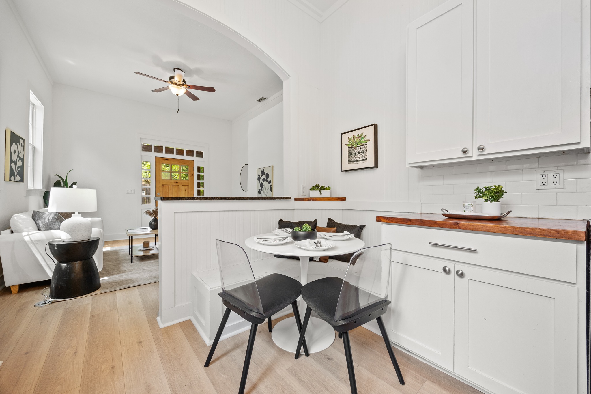 2503 Bryan Street Austin, TX 78702 - Photo 11 of 33 The built-in bench creates a cozy corner for dinner with friends or a quiet place to catch up on emails with a cup of coffee