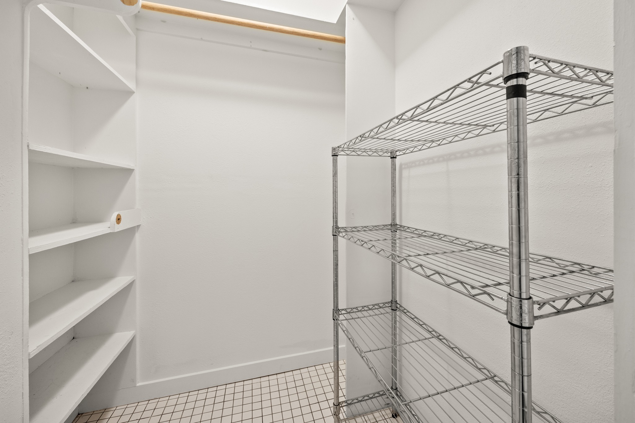 2503 Bryan Street Austin, TX 78702 - Photo 19 of 33 Located off the primary bedroom, this walk-in closet provides generous storage and organization space