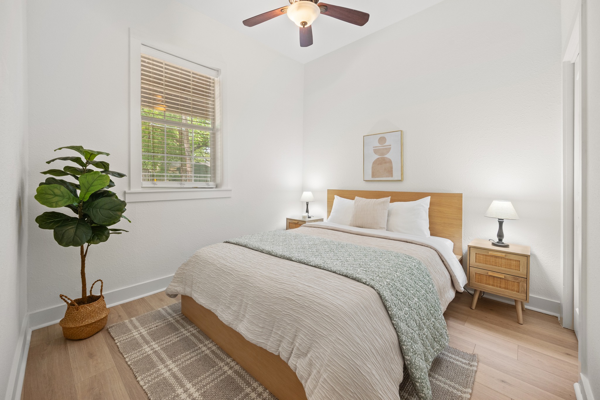 2503 Bryan Street Austin, TX 78702 - Photo 20 of 33 This first guest room is spacious enough for a queen bed and features the same wood flooring found in the rest of the home