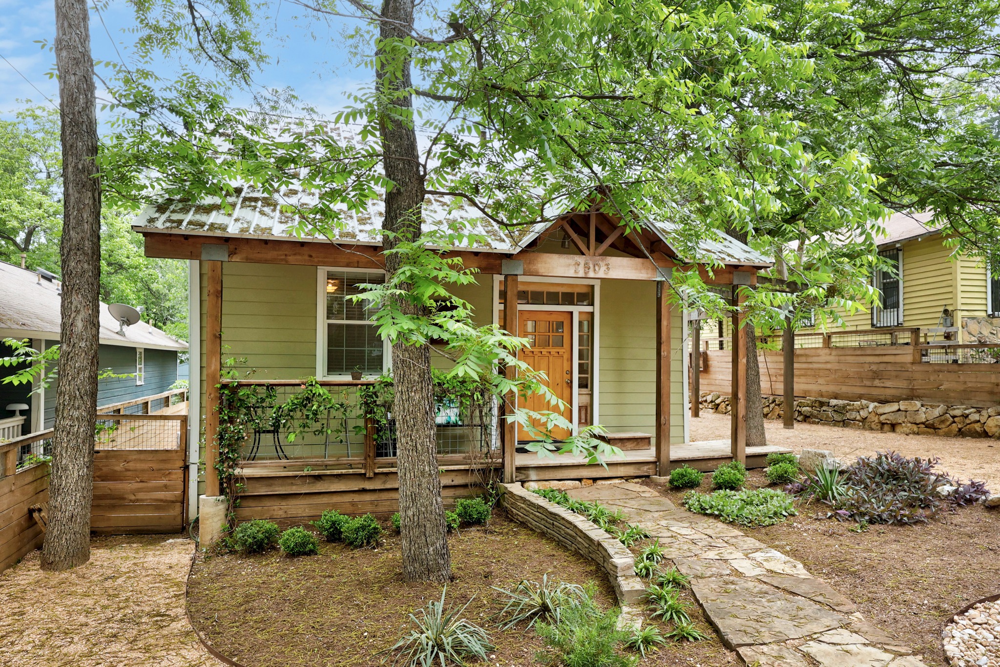 2503 Bryan Street Austin, TX 78702 - Photo 2 of 33 The front yard in this Rosewood pocket is designed with low-maintenance landscaping