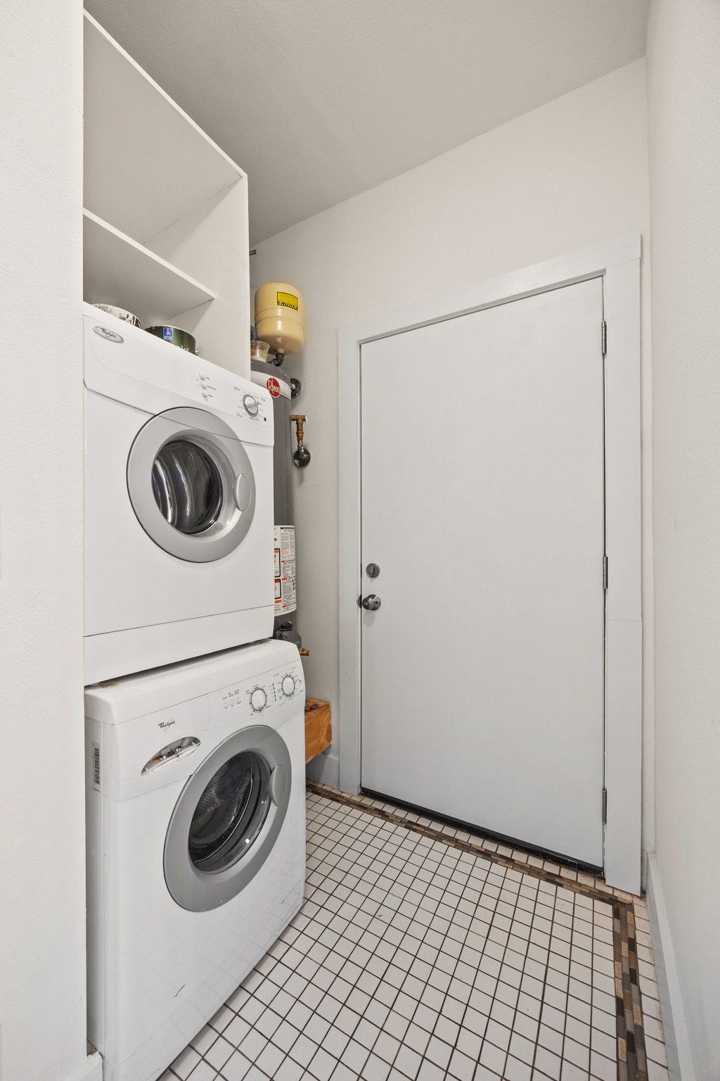 2503 Bryan Street Austin, TX 78702 - Photo 24 of 33 This dedicated laundry space is set up for stackable washer and dryer connections to maximize the footprint