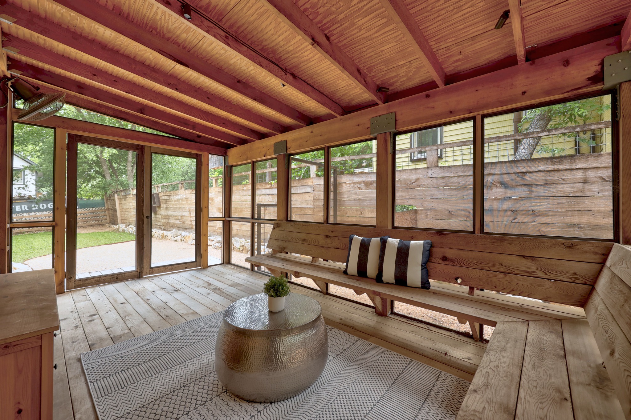 2503 Bryan Street Austin, TX 78702 - Photo 25 of 33 The back of the home opens up to this large, fully screened-in deck that serves as a second living area
