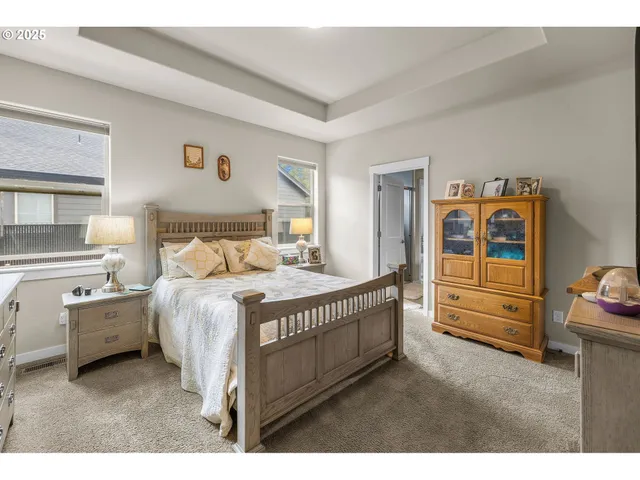 a bedroom with a bed and a cabinets