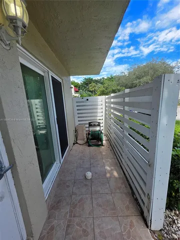 a view of a pathway along a building