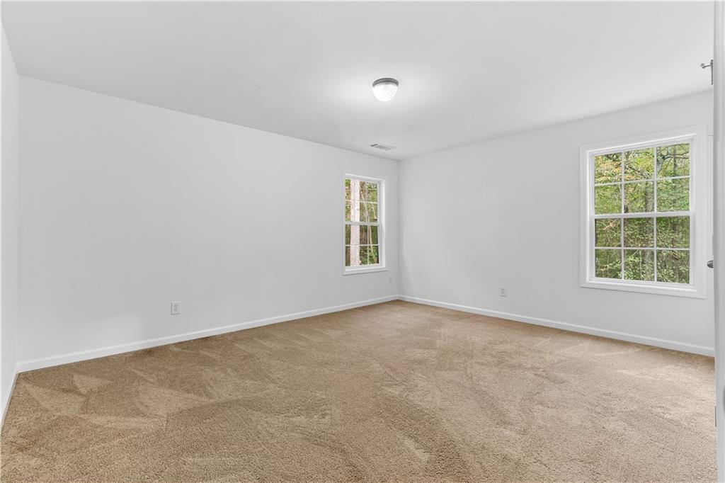80 Castle Court Ellijay, GA 30540 - Photo 12 of 31 an empty room with windows