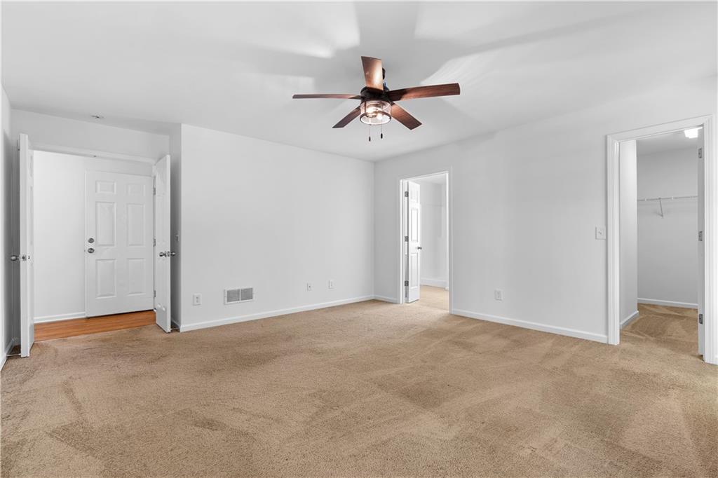 80 Castle Court Ellijay, GA 30540 - Photo 19 of 31 an empty room with closet and windows