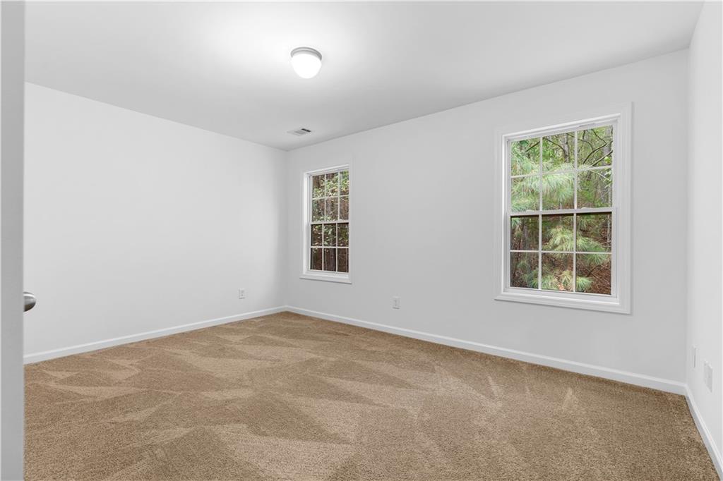 80 Castle Court Ellijay, GA 30540 - Photo 9 of 31 an empty room with a window