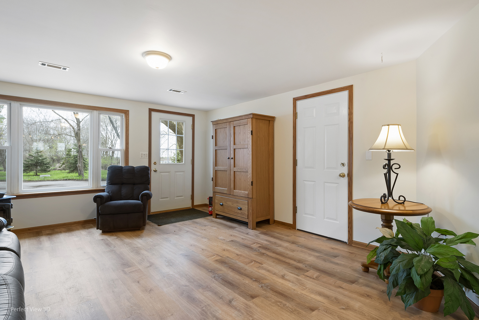 2580 Van Dyke Road Minooka, IL 60447 - Photo 13 of 32 a living room with furniture and a window