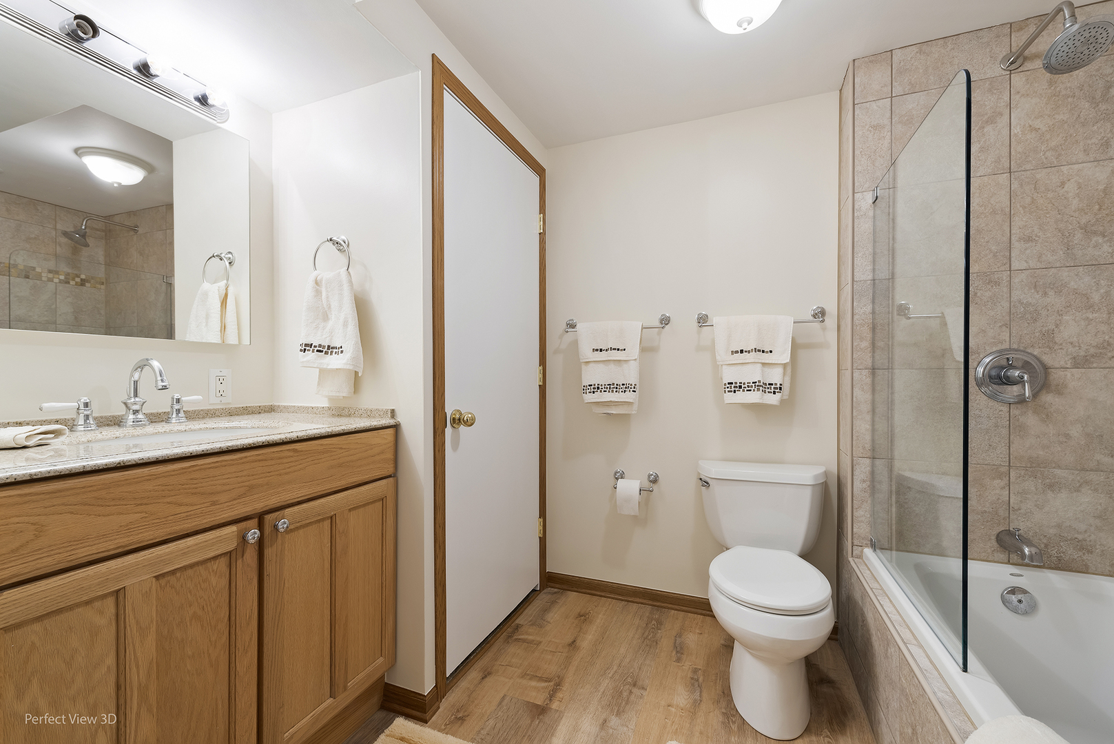 2580 Van Dyke Road Minooka, IL 60447 - Photo 18 of 32 a bathroom with a granite countertop sink toilet and shower