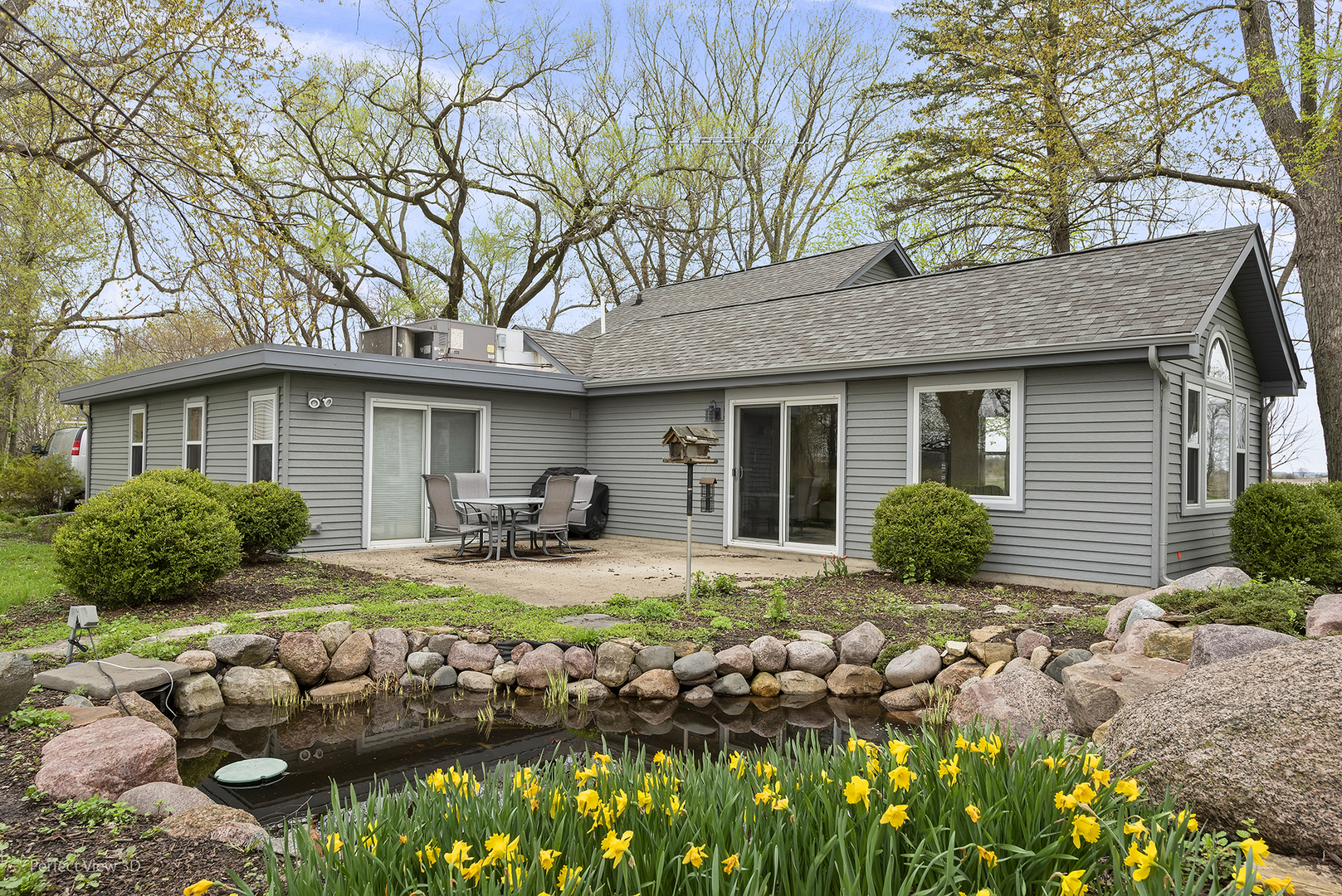 2580 Van Dyke Road Minooka, IL 60447 - Photo 2 of 32 a front view of a house with yard outdoor seating and green space